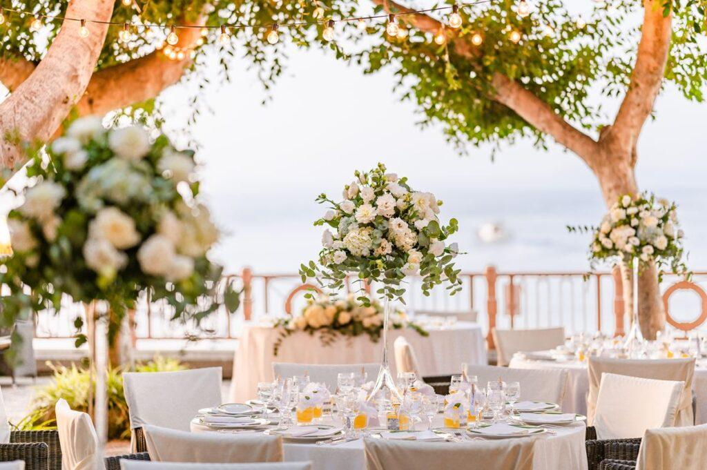 Wedding professionals presenting an all inclusive wedding package to an international couple in Italy